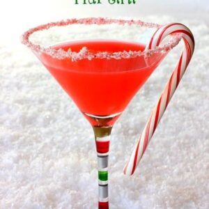 candy cane martini with snow background