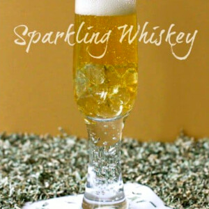 whiskey champagne cocktail with glitter