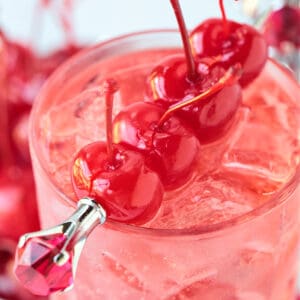 Cherries on a Dirty Shirley cocktail