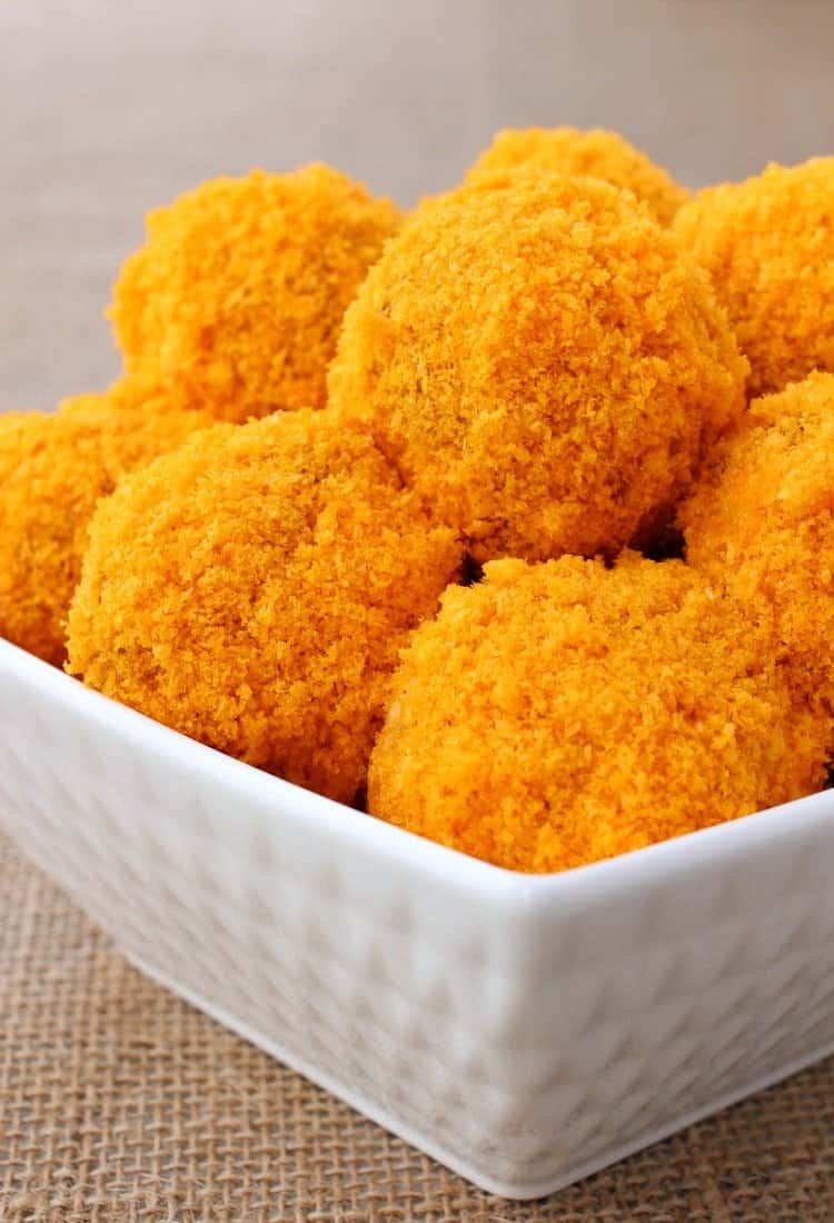 Stuffed Cheese Doodle Meatballs are coated in a cheese doodle crust!