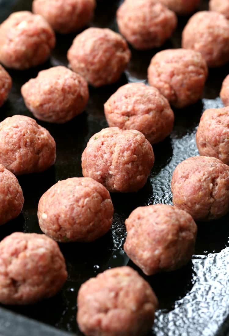 meatballs on a baking sheet for appetizer recipe