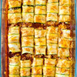 Chicken Stuffed Zucchini Enchiladas have a creamy chicken filling and are topped with sauce and cheese