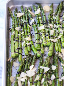 roasted asparagus drizzled with balsamic glaze and parmesan cheese