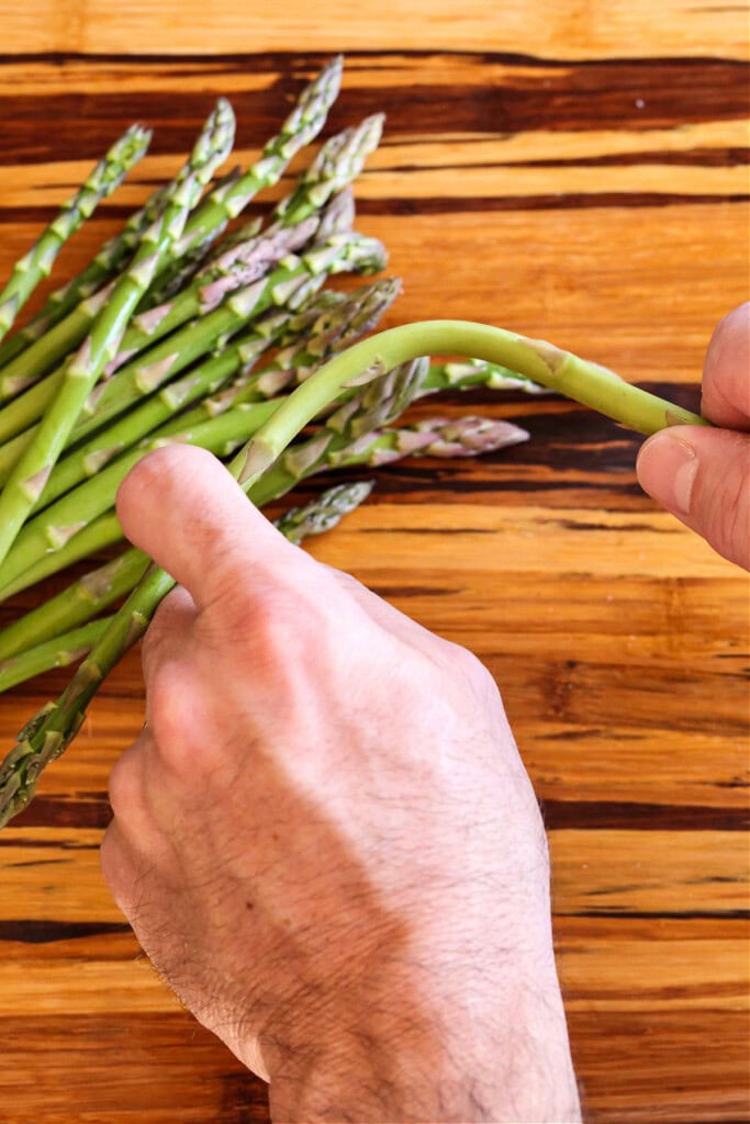snapping an asparagus stalk