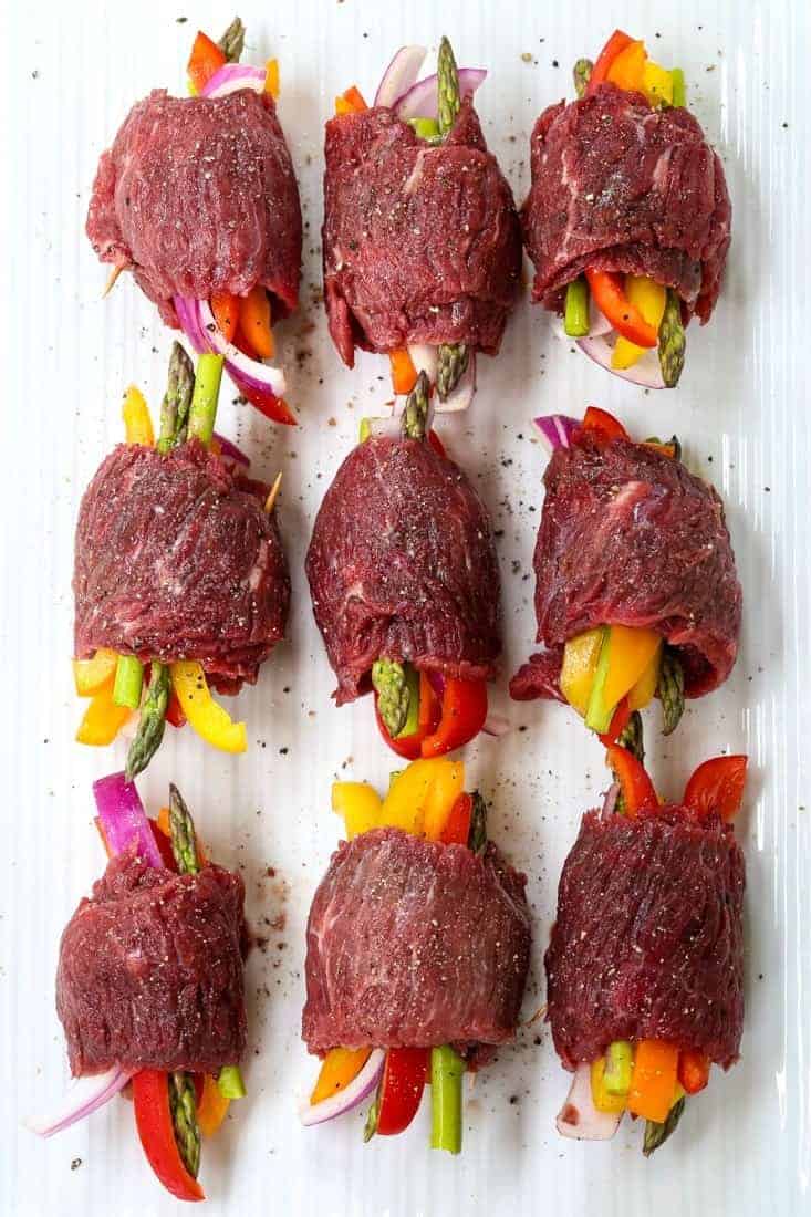 Asian Steak Roll Ups have vegetables rolled up in the center of a piece of steak
