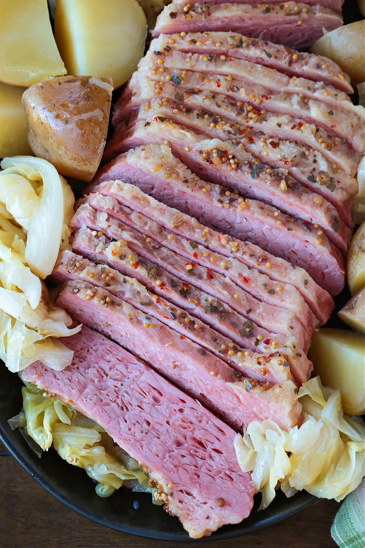 sliced corned beef with cabbage and potatoes