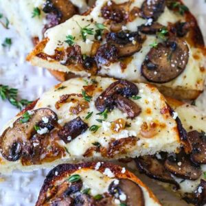 Mushroom and Thyme Cheese Bread appetizers sliced on platter