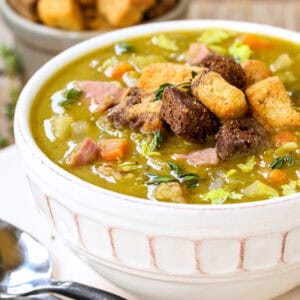 bowl of split pea and ham soup with croutons