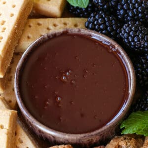 Chocolate Fondue Recipe in a bowl with fruit and cookies