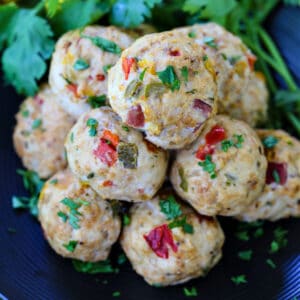Chicken Meatballs with peppers on a plate with cilantro