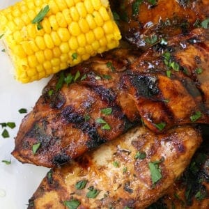 Chicken in the Grill served with corn on the cob