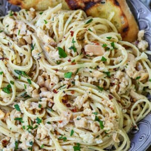 Linguine with Clam Sauce in a bowl with toasted bread pieces