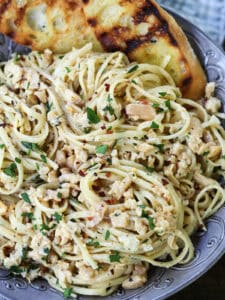 linguine in clam sauce on grey plate