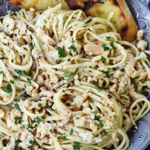 linguine in clam sauce on grey plate