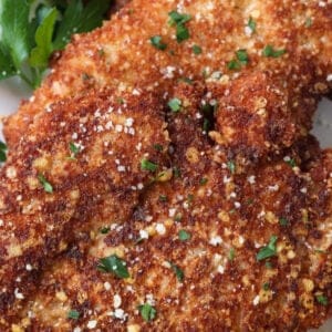 Breaded chicken cutlets with grated parmesan cheese