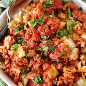 Cabbage Roll Casserole in a bowl with spoon for serving