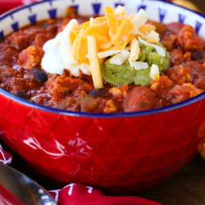 chicken chili in a bowl with toppings