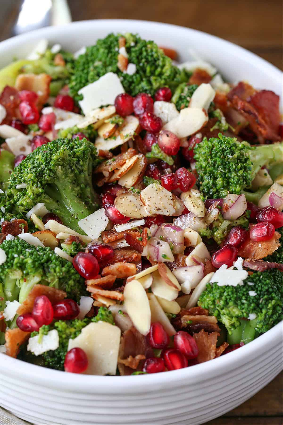 salad with broccoli, almonds and pomegranate seeds