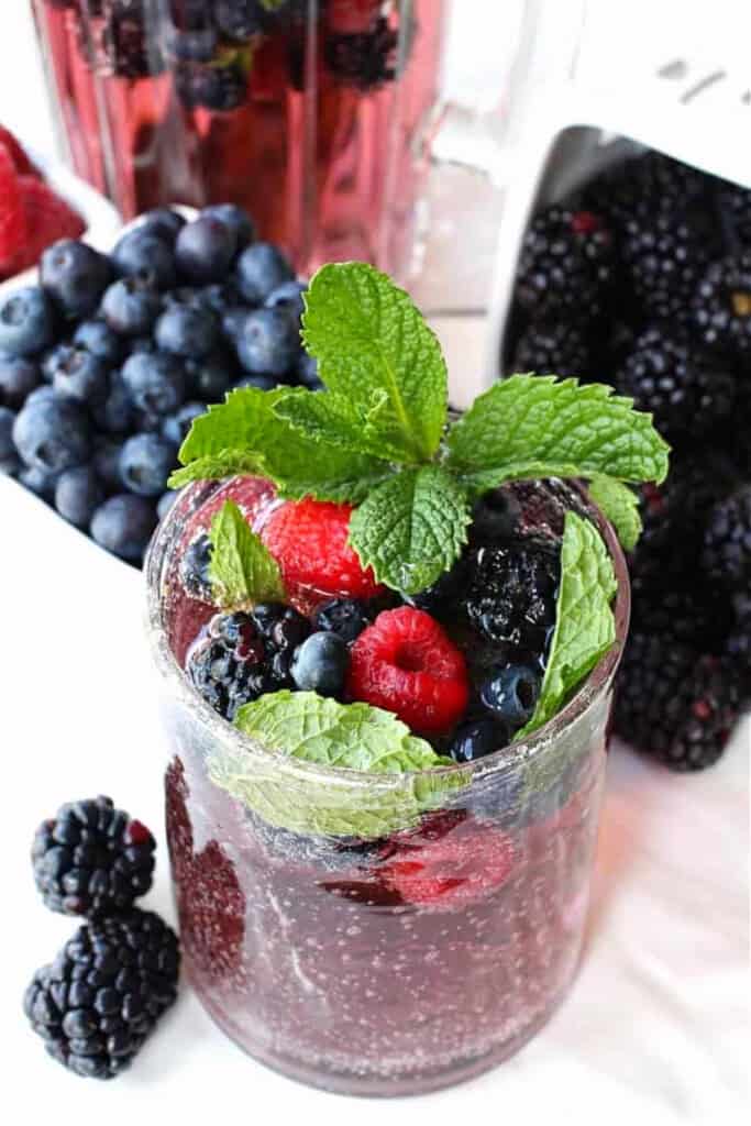 blackberry vodka punch with mint garnish
