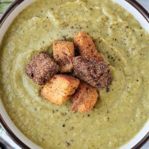 cream of broccoli soup in a bowl with croutons