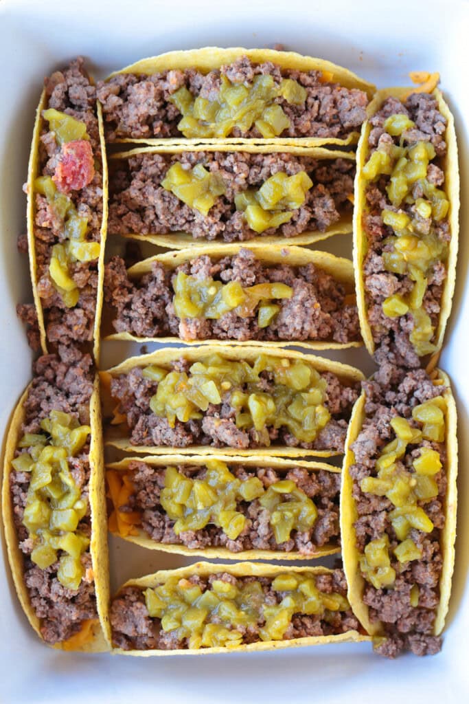 ground beef and green chiles in taco shells