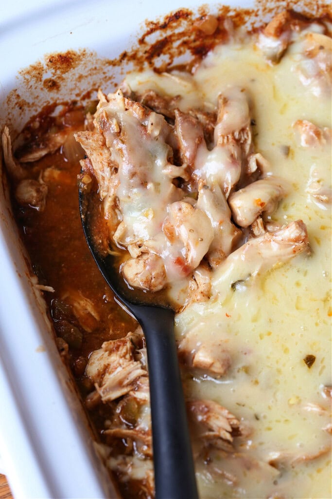 slow cooker chicken topped with cheese