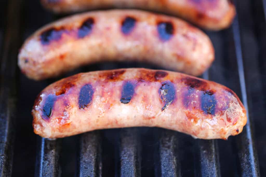 bratwurst on grill with grill marks
