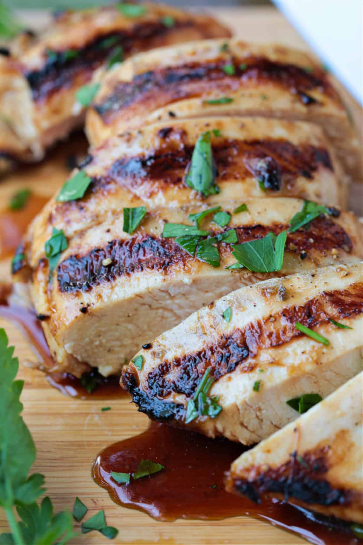 close up of sliced chicken breast with juice