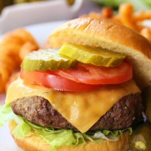 cheeseburger with top bun off to the side