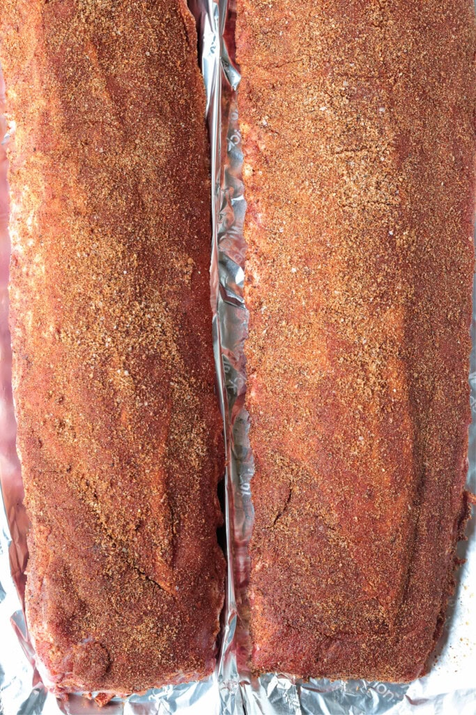 dry rubbed racks of ribs on foil