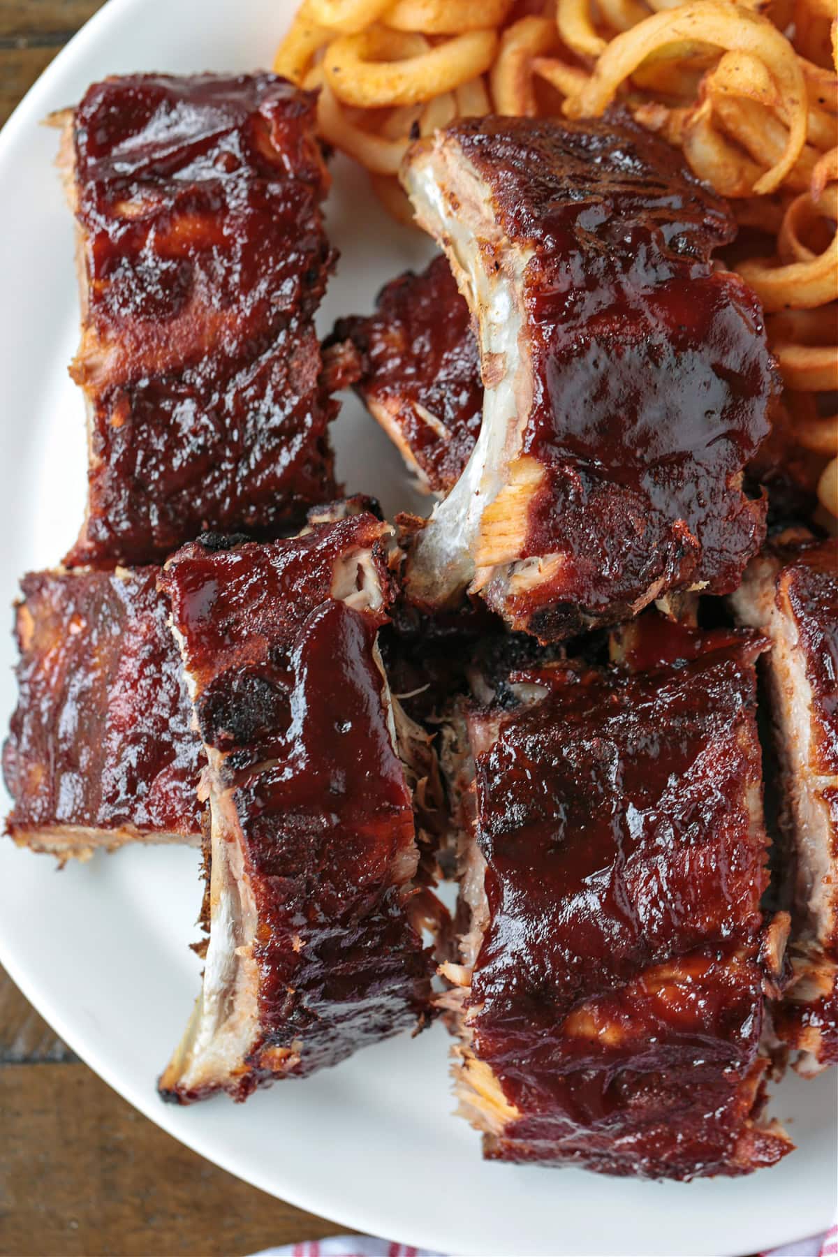 bbq ribs on a plate with french fries