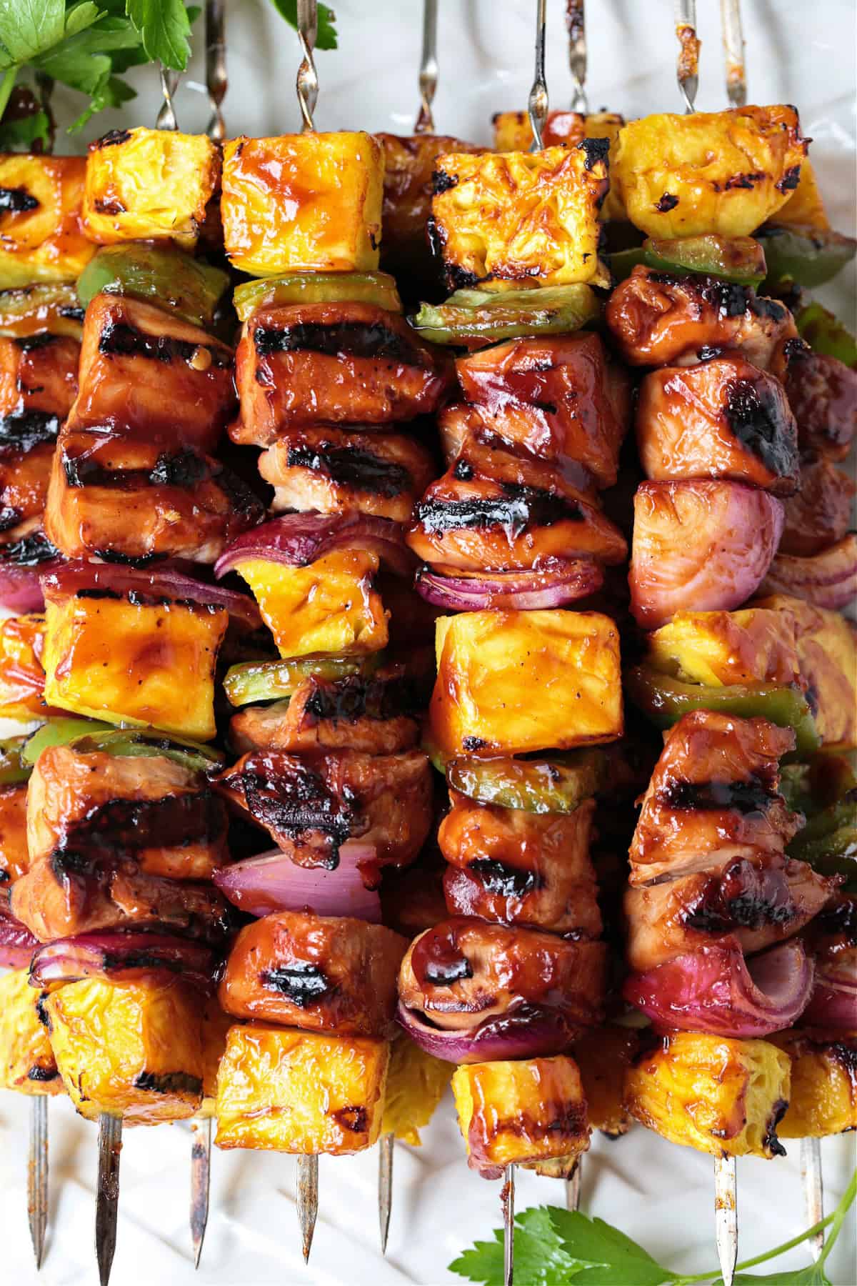grilled chicken and pineapple kabobs on skewers