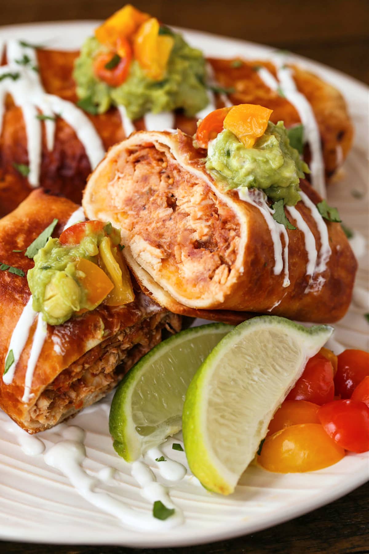 Chicken Chimichangas cut on a plate for serving