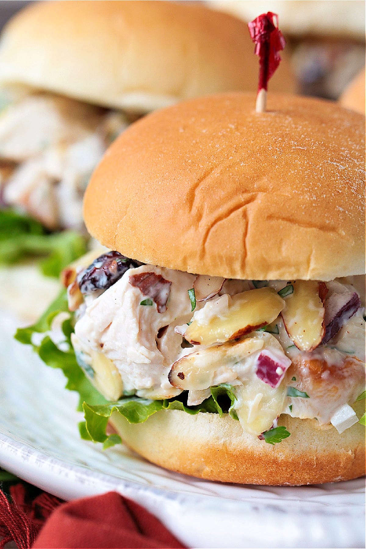 turkey salad on slider buns with lettuce and toothpick