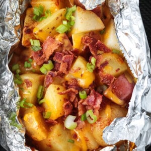 potatoes in a foil packet with cheese and bacon