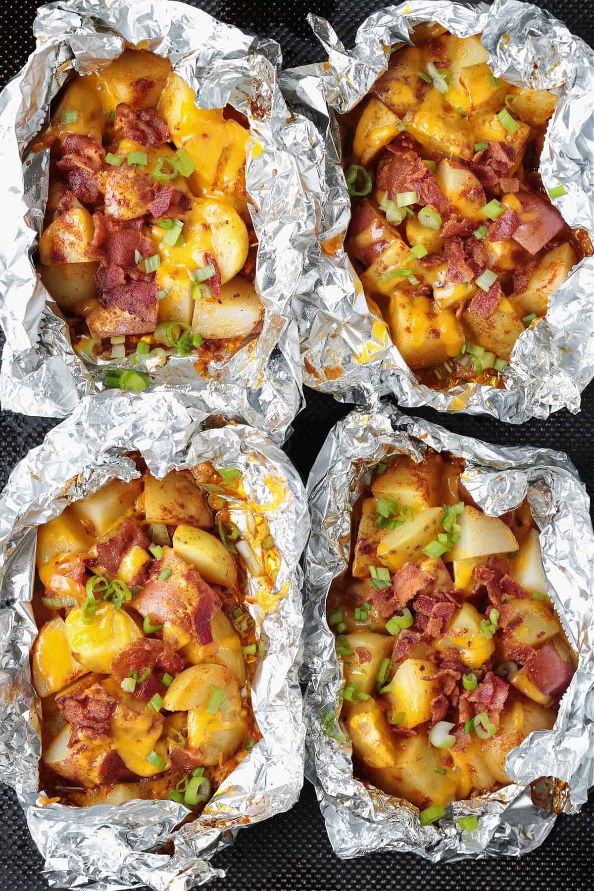 potatoes with cheese and bacon in foil pouches