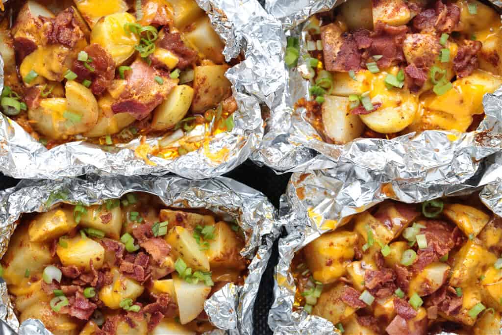 potatoes with cheese and bacon in foil packets