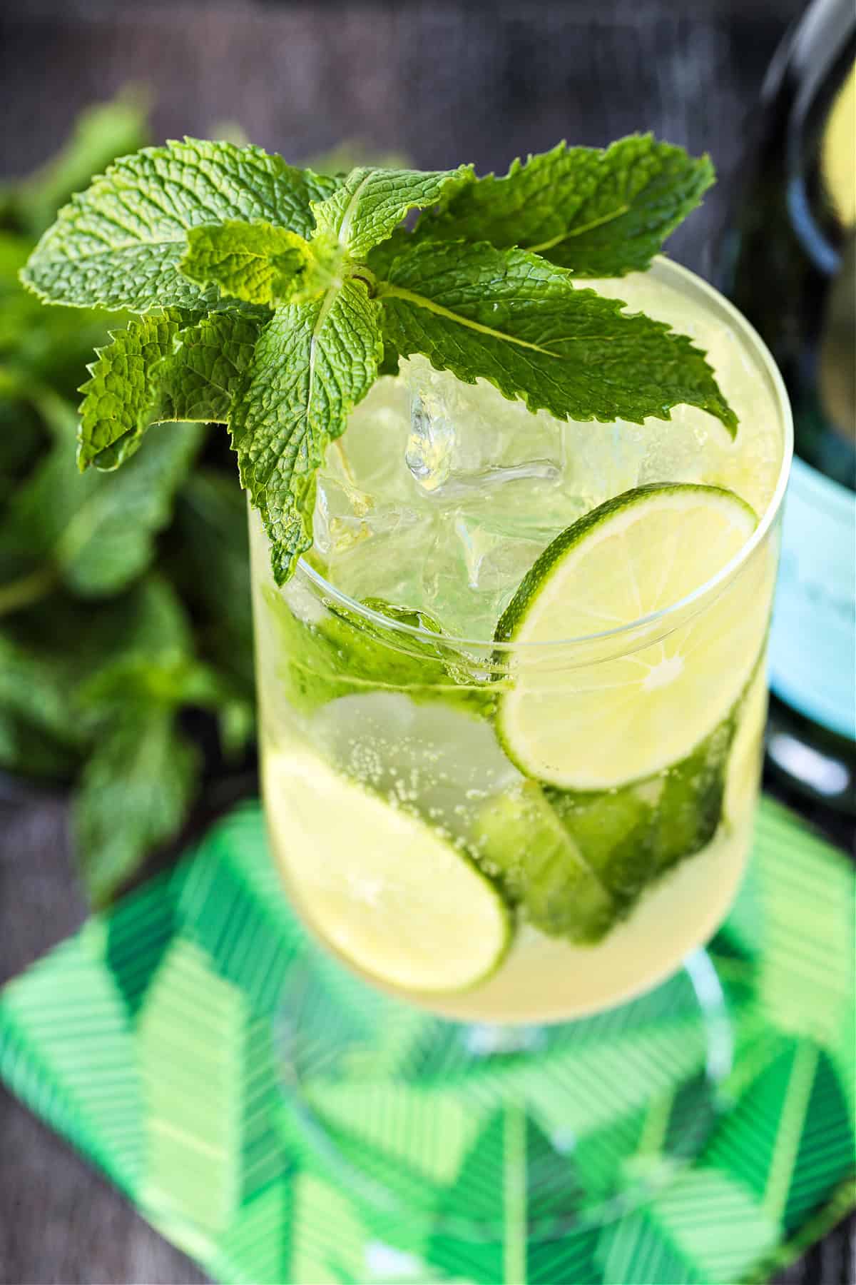 top of drink with fresh mint and limes