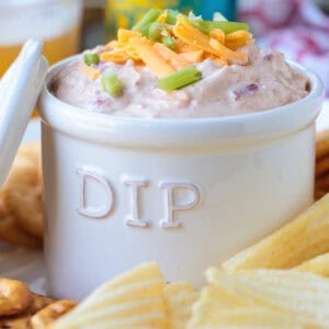 dip in a dip bowl with chips on the side