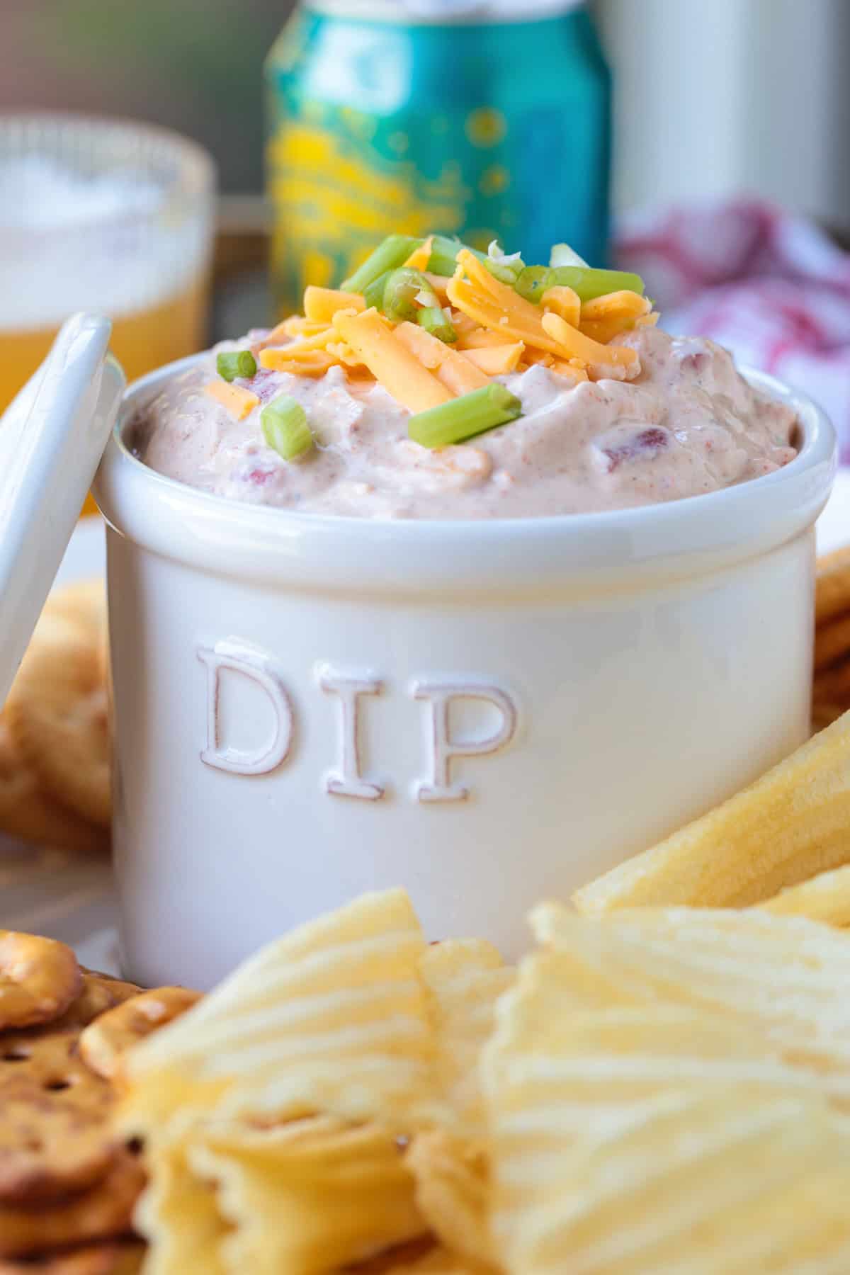 dip in a dip bowl with chips on the side