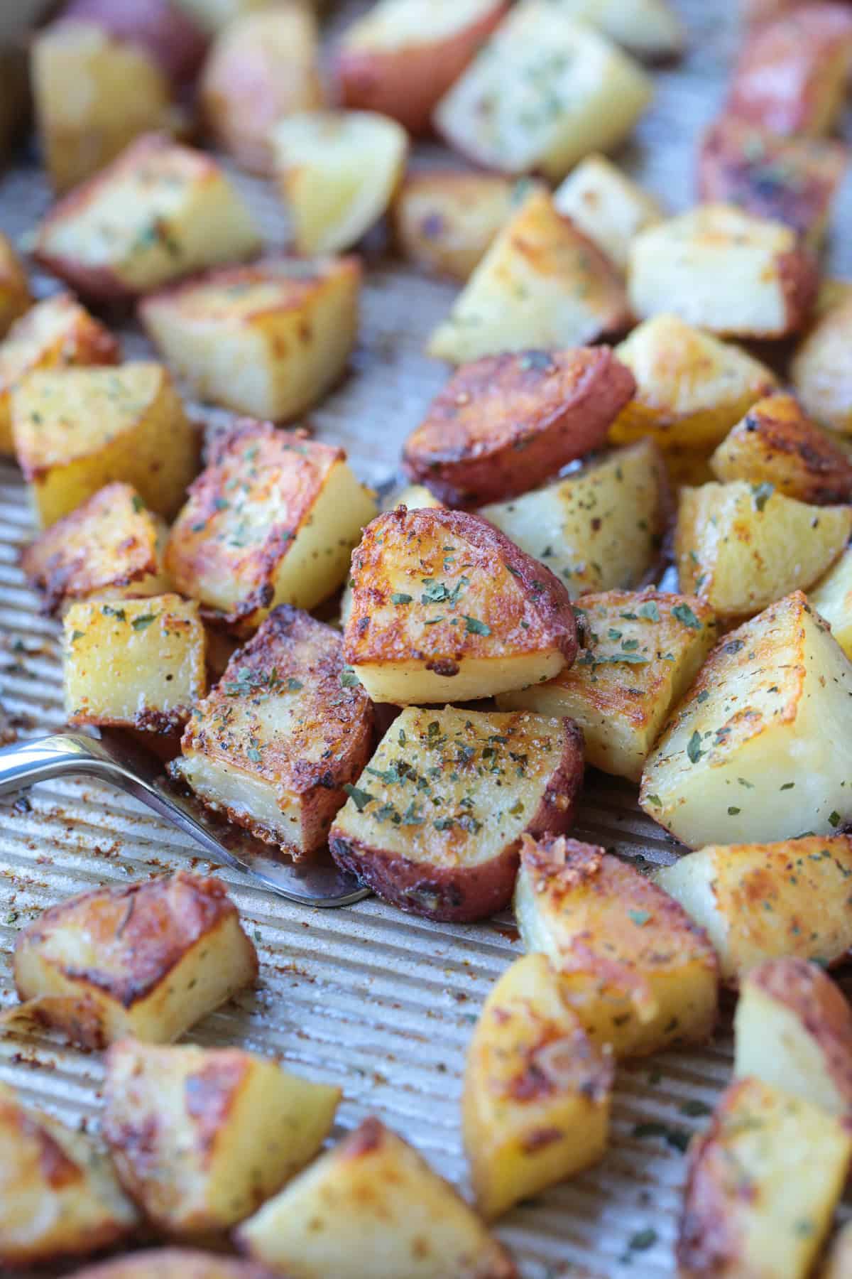 roasted potatoes on spatula with ranch seasoning