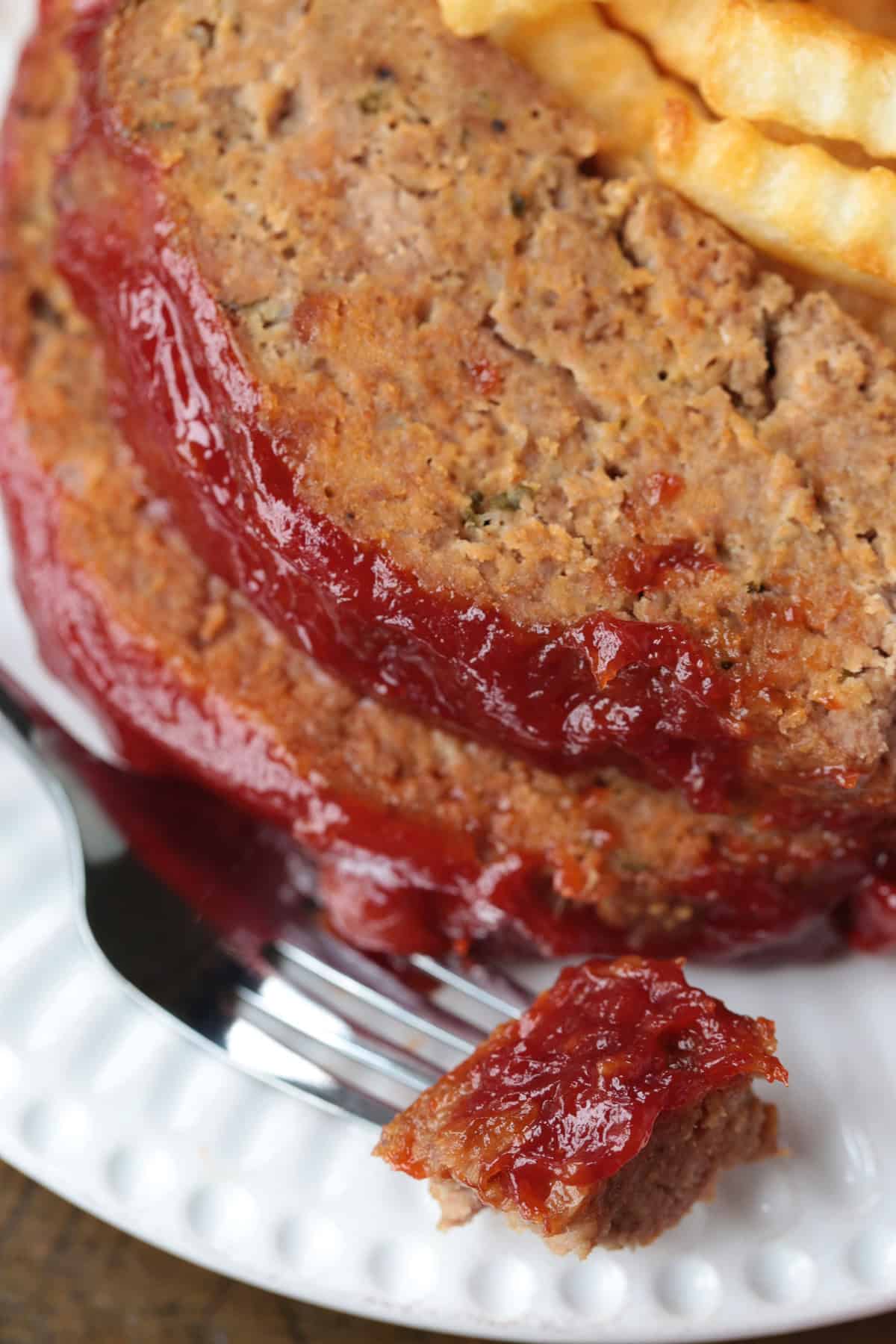 meatloaf on plate with fork on the side